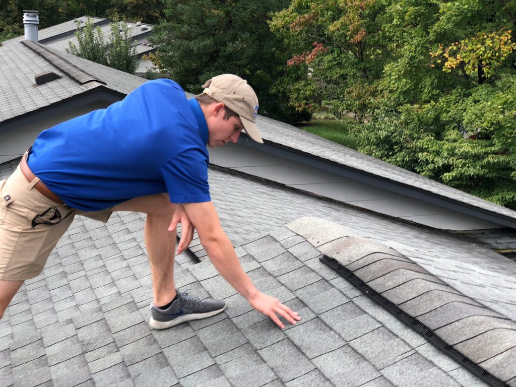 Beautiful home with a freshly installed roof at golden hour